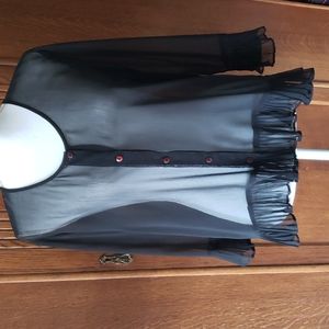 Sheer black top with embellishments